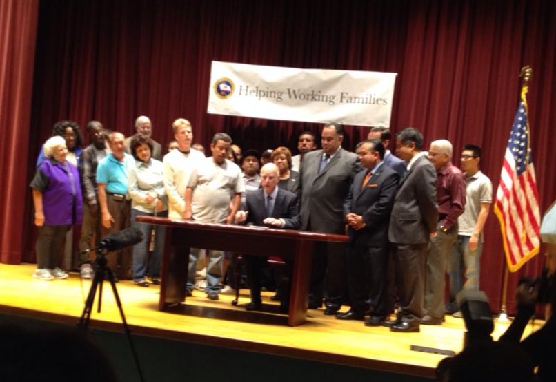 Governor bill signing ceremony for working families legislation